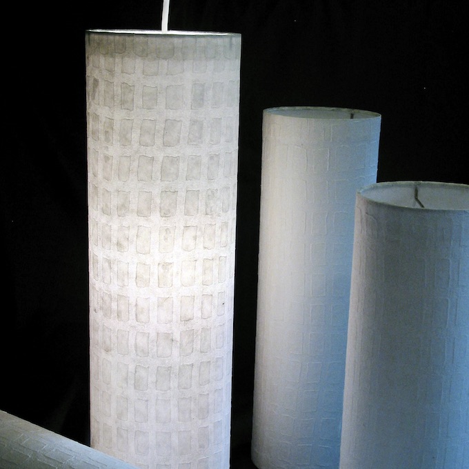 Long cylinder pendants with white window pane paper